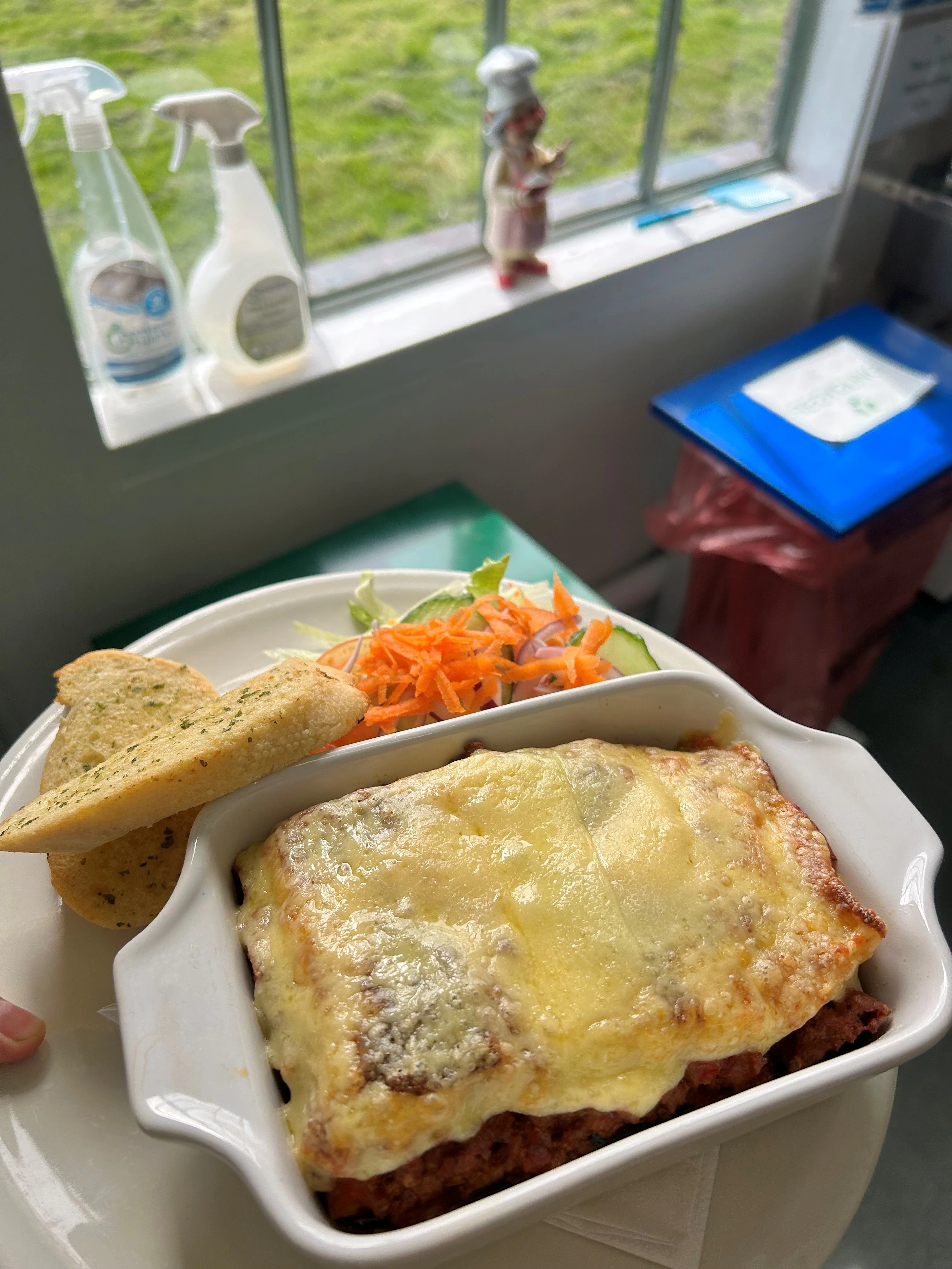 Home-made lasagne and garlic bread