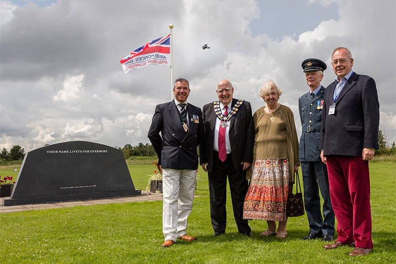 Richard Miller, Peter and Helen Eliott, David Rawlings and Peter Martin commemorating Armed Forces Day in 2016 at Stow Maries Great War Aerodrome in Maldon, Essex